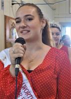 Incoming 2023 Fairest of the Fair Lillienne Cauffman greets 2022 Meat Animal Sale attendees