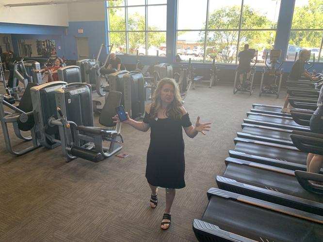 Ann Fulmer talks about the YMCA's fitness wellness center the tour