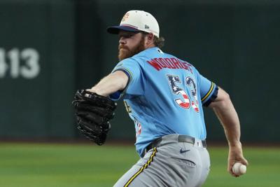 Jul 4, 2026; Phoenix, Arizona, USA; Milwaukee Brewers pitcher Brandon Woodruff (53) throws against the Arizona Diamondbacks in the first inning at Chase Field. Mandatory Credit: Rick Scuteri-Imagn Images