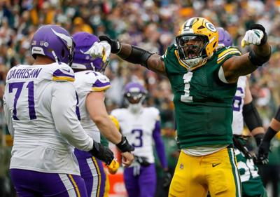 Green Bay Packers defensive end Micah Parsons (1) celebrates after sacking Minnesota Vikings quarterback J.J. McCarthy (9) on