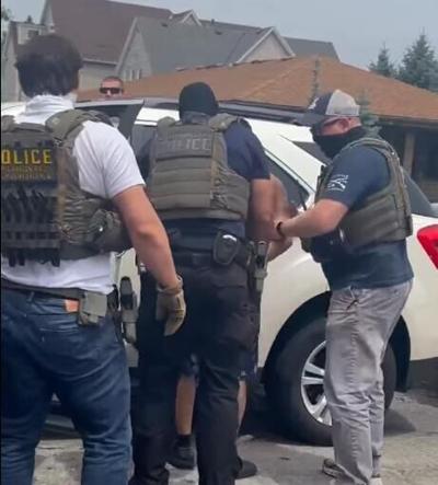 A screenshot of video posted to social media showing Immigration and Customs Enforcement agents arresting someone in Milwaukee on June 28. The Journal Sentinel has not independently verified the details of the arrest.