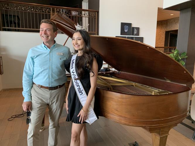 Skip Harless, managing director for the Grand Geneva Resort & Spa, poses for a photo with Miss Wisconsin