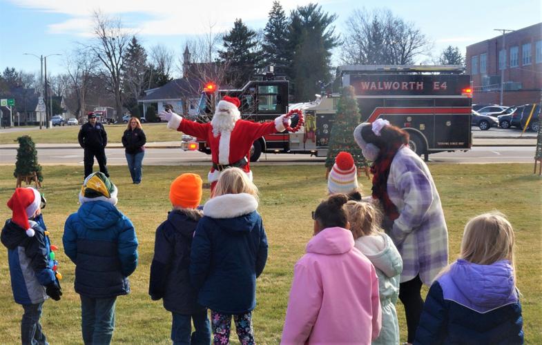 Santa arrives at Edwin P. Heyer Square in downtown Walworth on Dec. 1