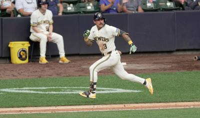 Milwaukee Brewers shortstop Joey Ortiz (3) hits a double during the sixth inning of their game against the New York Mets