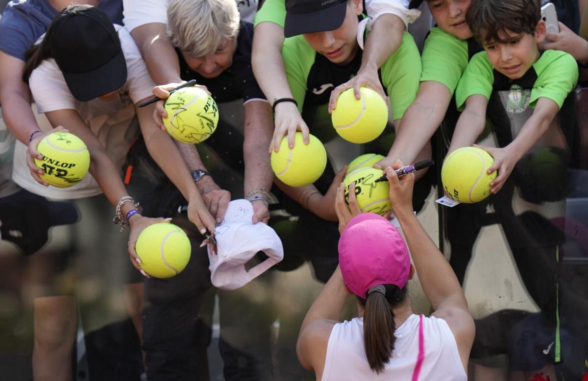 Top tennis players say they're playing too much