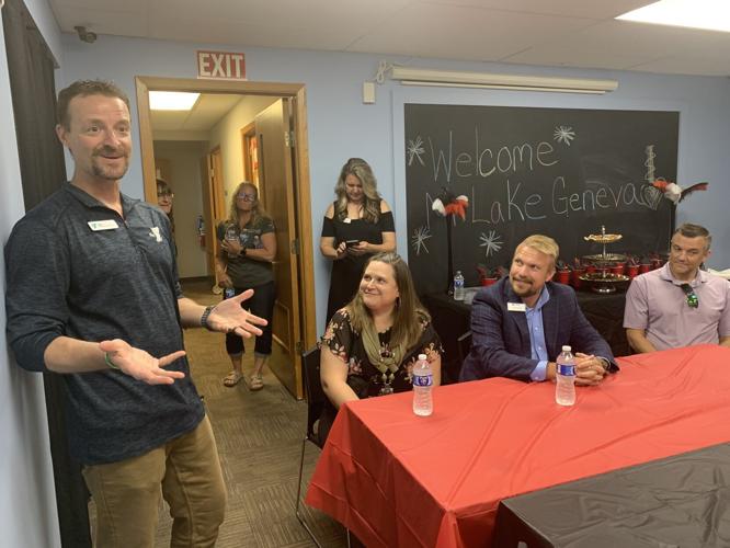 Geneva Lakes Family YMCA President and CEO Michael Kramp welcomes Skip Harless and his staff to the YMCA