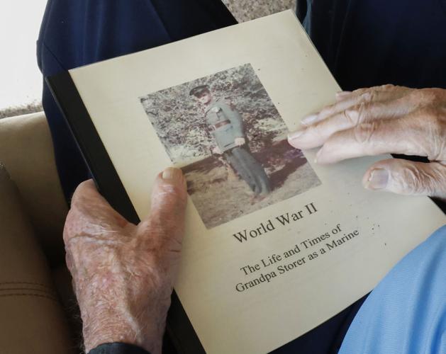 John Storer with World War II memoir
