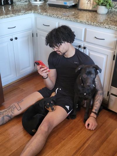 Braeden Carrington with his dogs