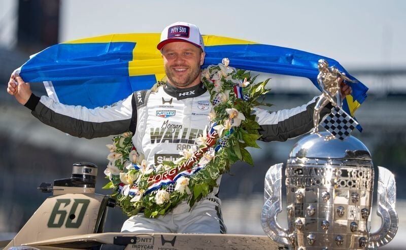 Felix Rosenqvist, winner of the 110th Indianapolis 500, poses for photos the following morning, May 25, at Indianapolis Motor Speedway.