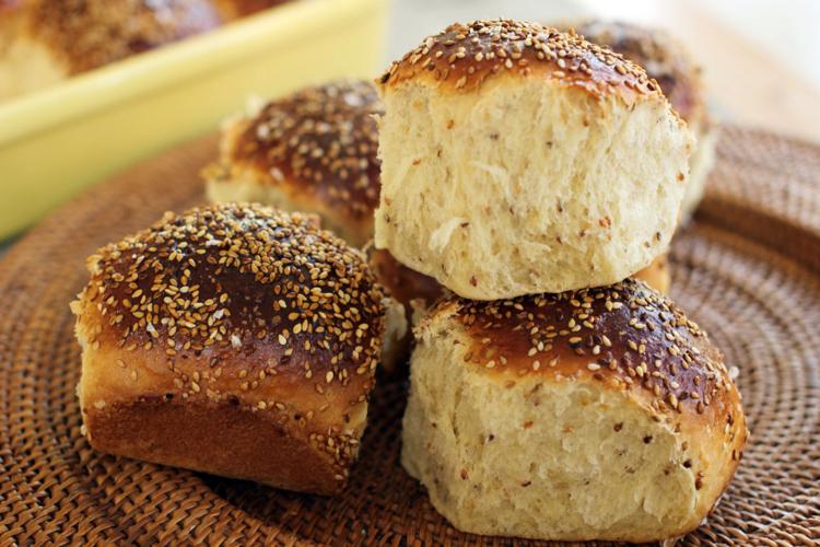 A moist and buttery seeded dinner roll with a sweet side