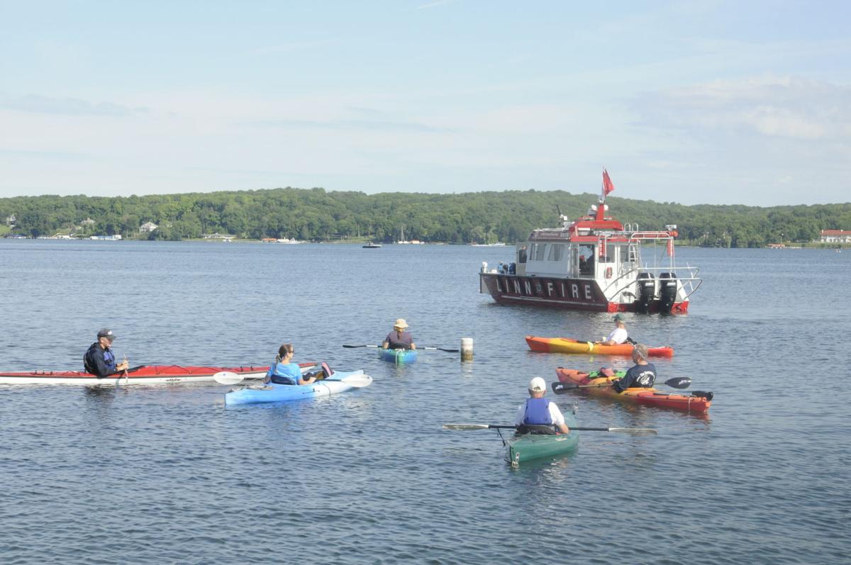 Kayakers, starry stonewort