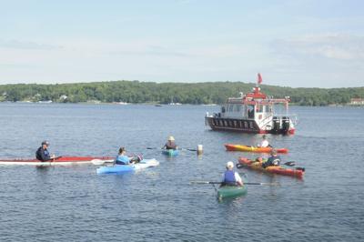 Kayakers, starry stonewort