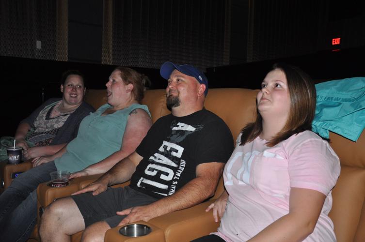 Jenny Sokolowski, Becky Johnson, Kevin Johnson and Ariel Johnson enjoy the reclining seats
