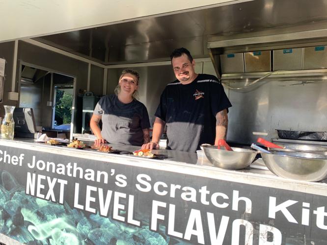 Fiiddlesticks on Wheels cook up some food at Taco Fest (copy)