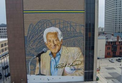 Work appears to be nearly completed on an 80-foot-by-100-foot mural featuring former Milwaukee Brewers announcer Bob Uecker on the north facade of the Wintrust Financial Center at 731 N. Jackson St. in downtown Milwaukee, Wisconsin on June 8, 2026. The ...