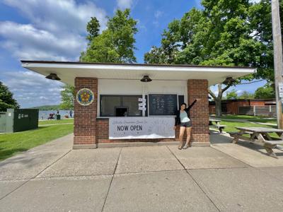 Grace Narayanan proudly stands next to her recently-opened business, Malini Bikini