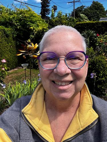 Cathy Smithwick stands in Northern California garden