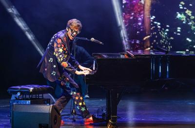 Tom's Elton Tribute performing