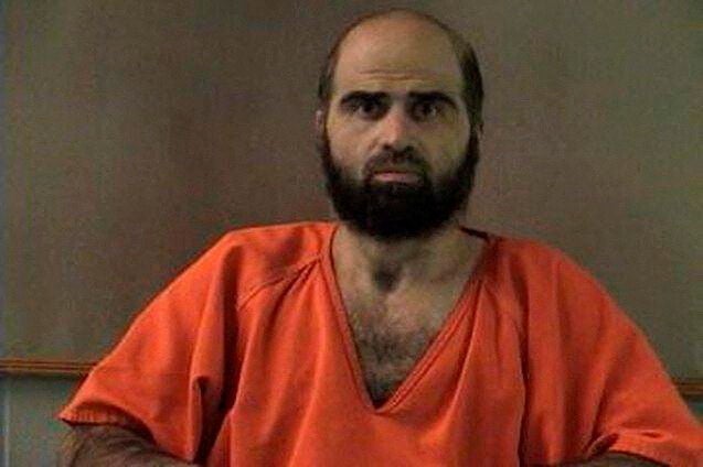 FILE PHOTO: Handout photo of Nidal Hasan, charged with killing 13 people and wounding 31 in a November 2009 shooting spree at Fort Hood.