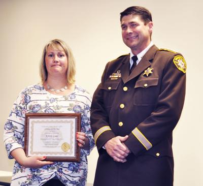 Kristy Laue county sheriff records clerk with Sheriff Kurt Picknell