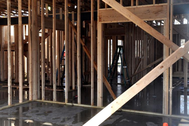 Construction of the interior walls and the second floor of a two-story building