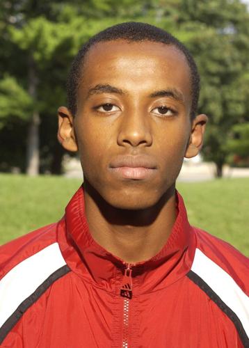 Quarter century team headshot Simon Bairu