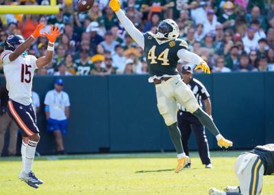 Green Bay Packers linebacker Zaire Franklin (44) breaks up a pass intended for Chicago Bears wide receiver Rome Odunze (15) on