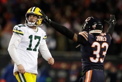 Green Bay Packers place kicker Brandon McManus (17) reacts to missing a field goal late in the fourth quarter as Chicago Bears cornerback Jaylon Jones (33) celebrates during their wild-card playoff football game Saturday, January 10, 2026, at Soldier Fi...