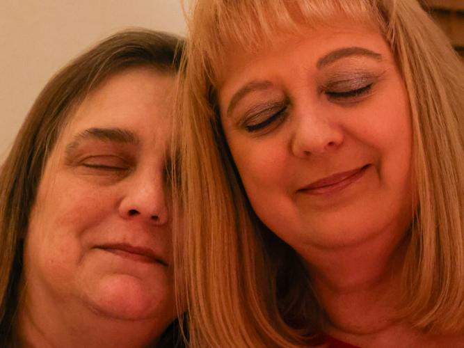 Sisters with eyes closed