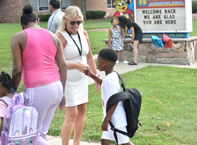 Teacher and student fist bump
