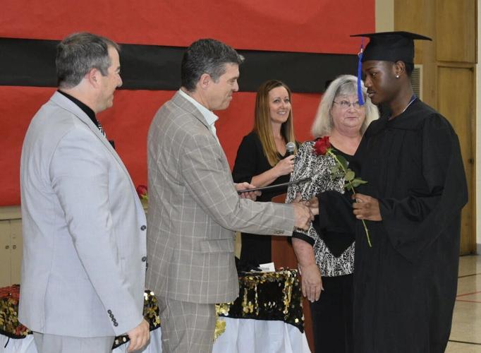 Hillcrest graduate Marshaun Lang and superintendent