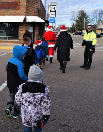 Walworth Police Department Officer Travis Reedy provides traffic control