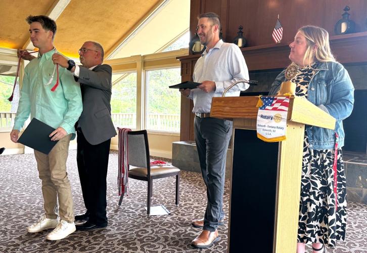 Big Foot High School Class of 2024 senior AJ Hartmann receives his Rotary Diploma Endorsement Program honor cord
