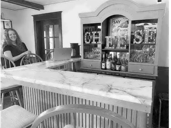 Cheese shop owner following in family tradition