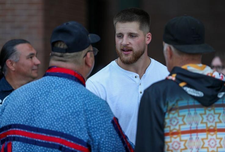 Green Bay Packers tight end Tucker Kraft talks with members of the Oneida Nation on Tuesday, July 1, 2025, at Lambeau Field in Green Bay, Wis. Pool players from around the world will play in the Women’s Professional Billiards Association 8-Ball World Ch...