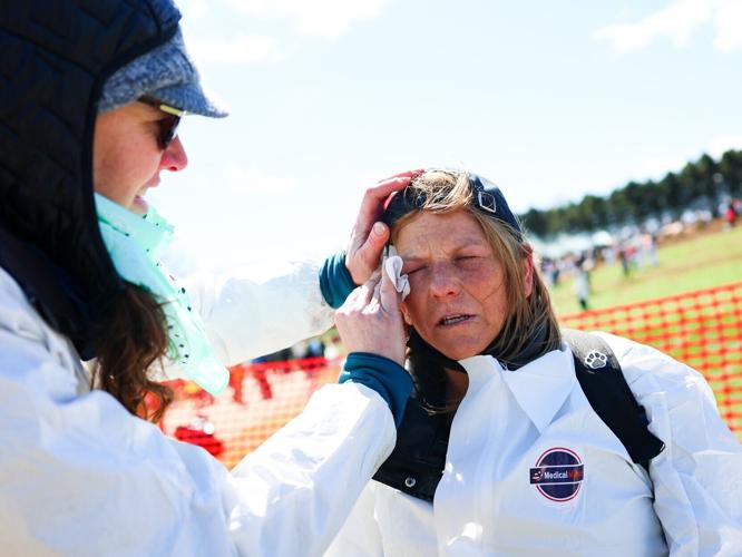 An activist is treated after being tear gassed