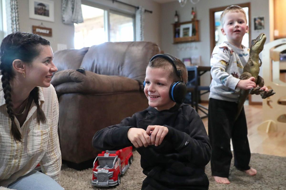 Brody with therapist and brother