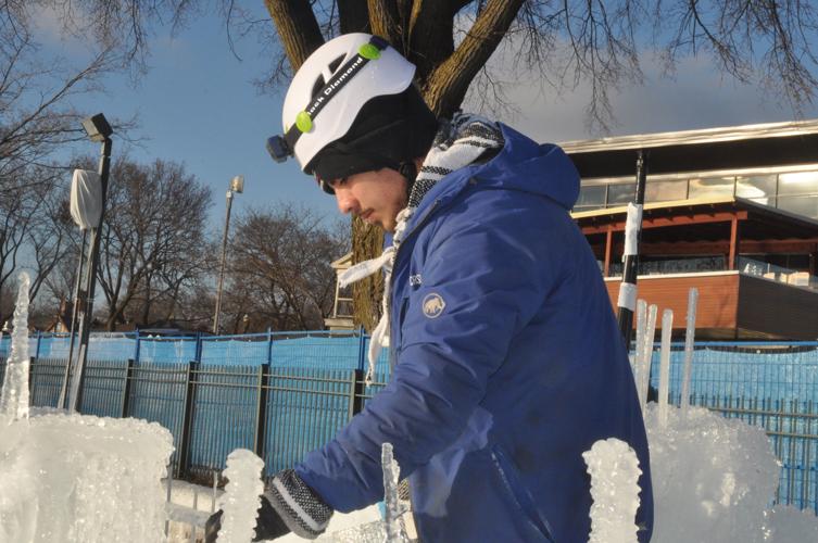 Jair Huerta of Walworth fuses some icicles into the ice structure that is being built on Riviera Beach