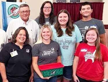 Elena Nicholson with volunteers for Operation Christmas Child shoebox gift program
