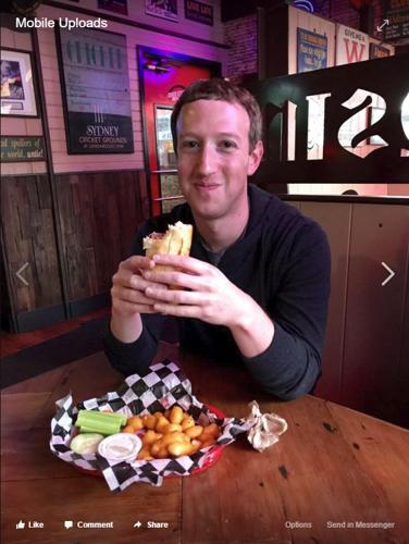 The face of Facebook visits Wisconsin; Mark Zuckerberg feeds calf, eats brat