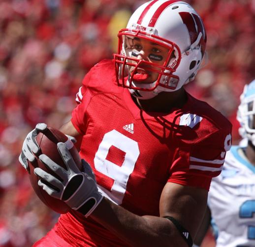 Travis Beckum action quarter century fb