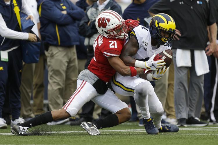 CORRECTION Michigan Wisconsin Football