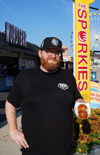 WurstBar Executive Chef Curtis Peterson with the Sporkies champion Beer Cheese Wisconsin Lava Cake