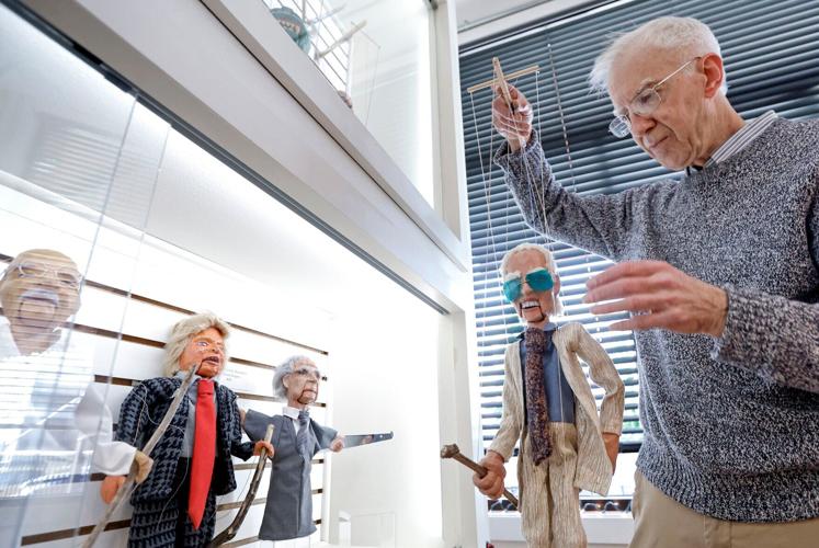Ken Vogel with Joe Biden troll marionette