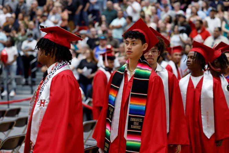 Emmanuel Ramirez enters graduation ceremony