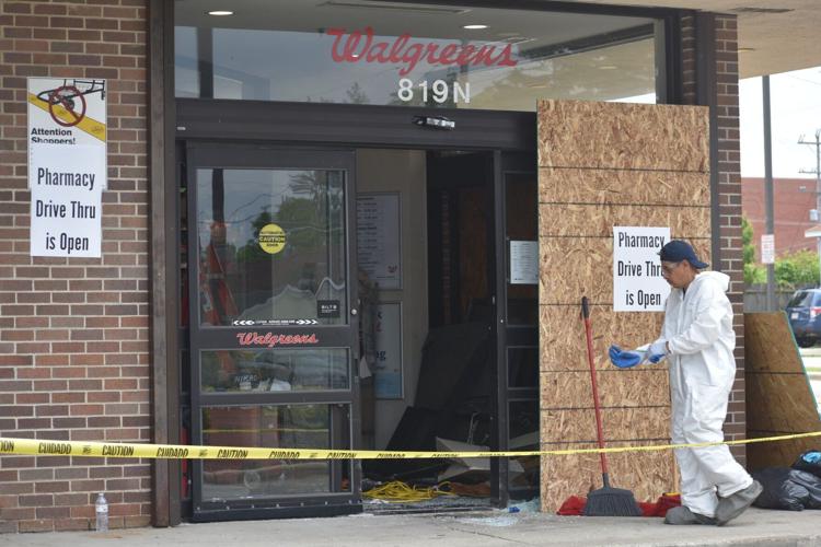 Crews clean up after Walgreen's car crash
