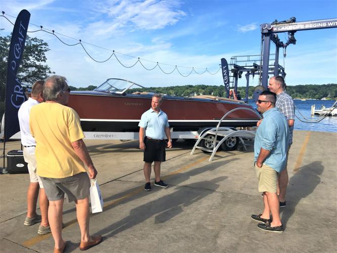 Grand Craft Boats president and CEO Patrick Gallagher field questions about the new Burnham runabout