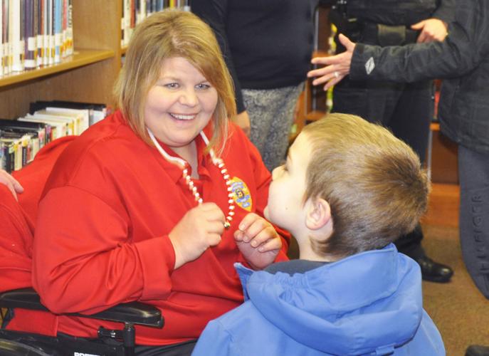 Police Chief Laura Washer with Griffin Jenski