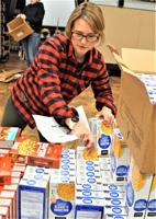 Spreading good cheer; Geneva Lake West Rotary's Holiday Food Assistance Programs provides meals for needy