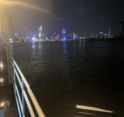 Ho Chi Minh City skyline at night from our riverboat.